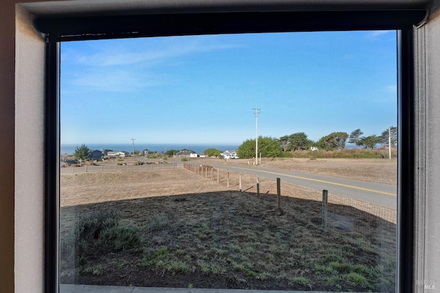 view of yard with a rural view