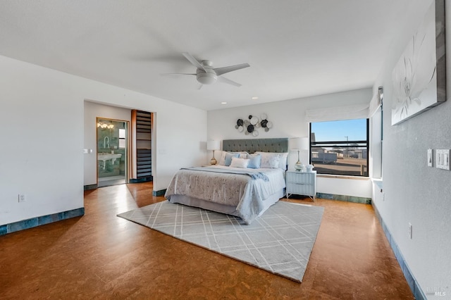 bedroom featuring baseboards and ceiling fan