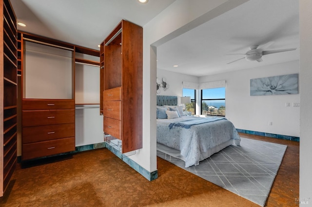 bedroom with baseboards, recessed lighting, and a ceiling fan
