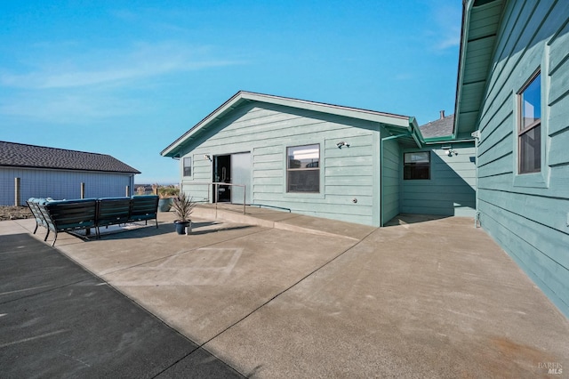 rear view of house with a patio area