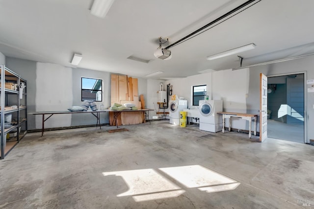 garage featuring a garage door opener and water heater