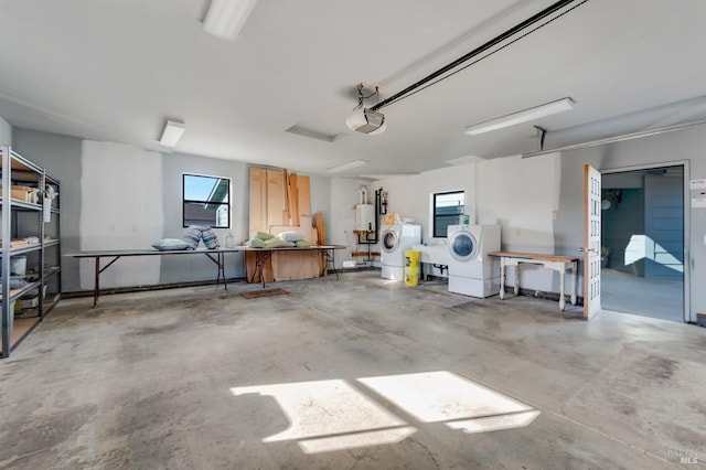 garage with water heater and a garage door opener