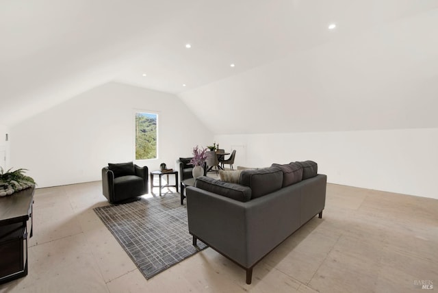 living room with recessed lighting and lofted ceiling