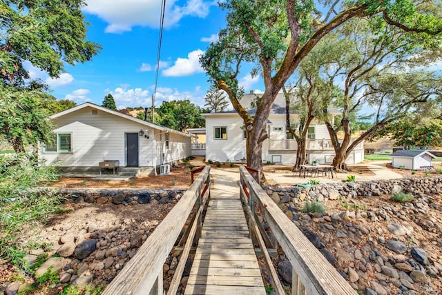 rear view of house featuring a patio