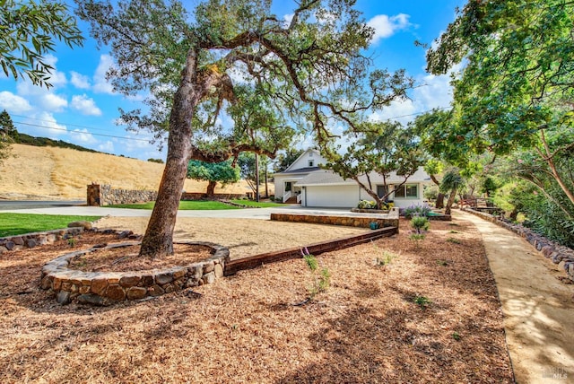 view of yard featuring a garage