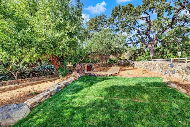view of yard featuring fence