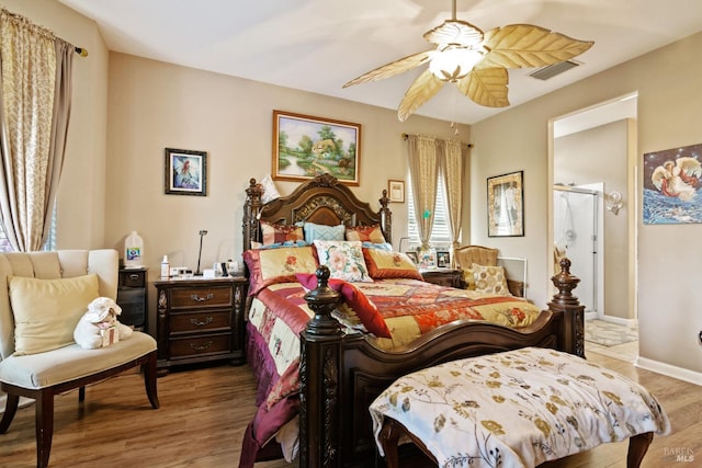 bedroom featuring ceiling fan and hardwood / wood-style flooring