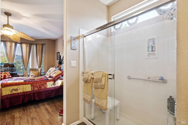 interior space with hardwood / wood-style floors and ceiling fan