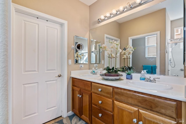 bathroom with double vanity and a sink