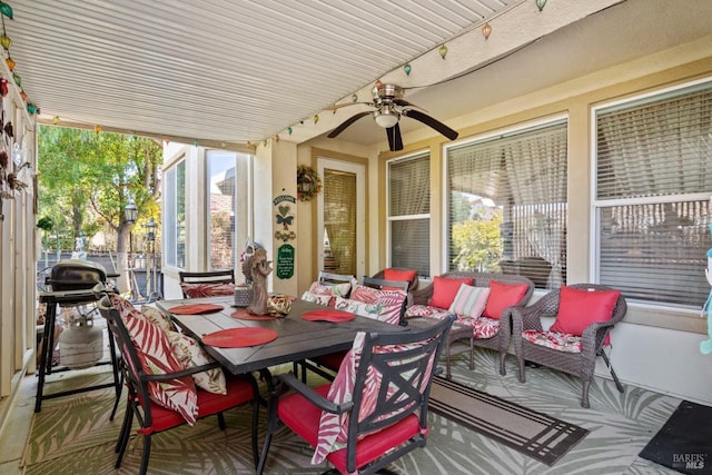 exterior space featuring ceiling fan, an outdoor living space, and outdoor dining space