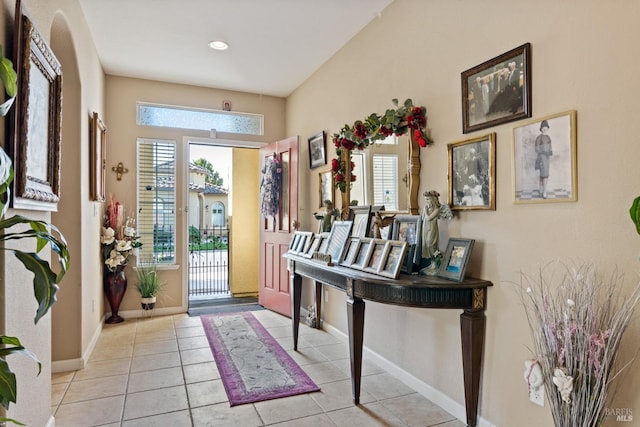 tiled entryway with plenty of natural light