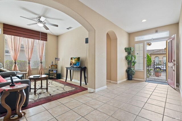 living room featuring ceiling fan