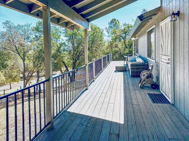 deck with an outdoor living space