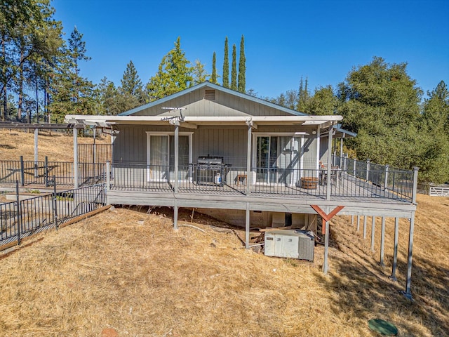 view of front of home with a wooden deck