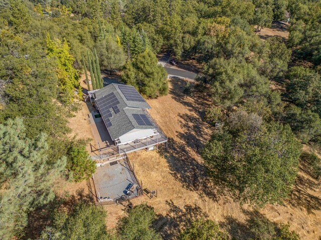 aerial view featuring a view of trees