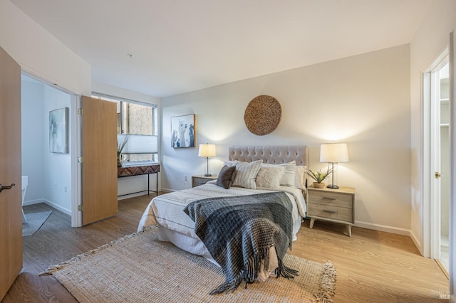 bedroom featuring light hardwood / wood-style flooring