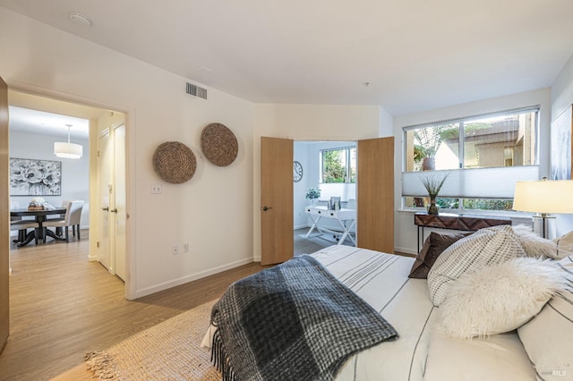 bedroom featuring wood-type flooring