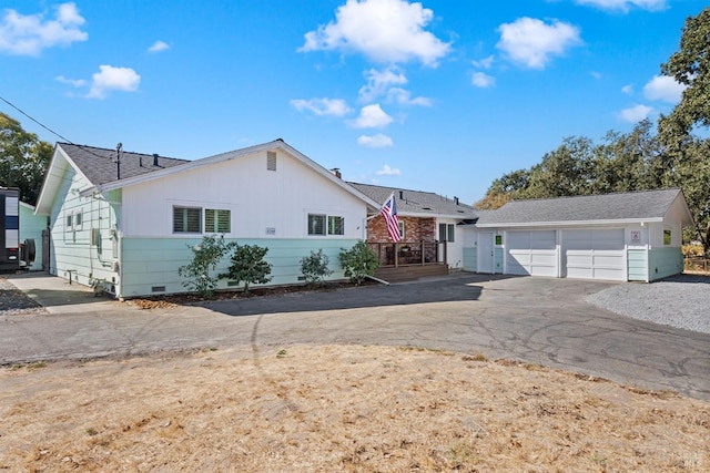 ranch-style home with a garage