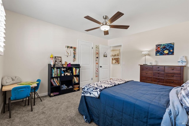 bedroom with ceiling fan and carpet floors