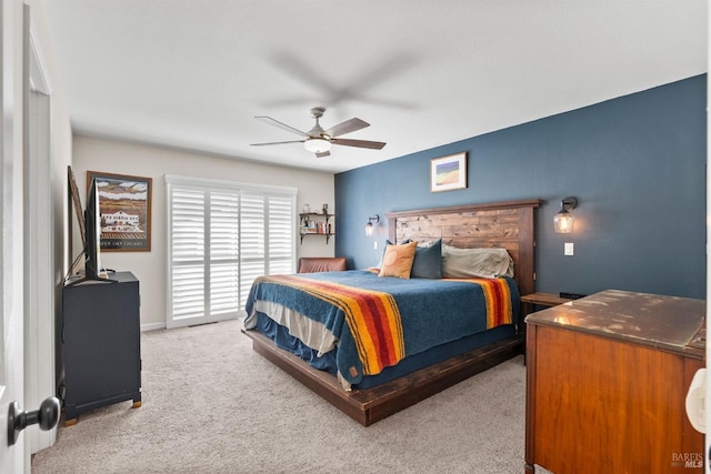 bedroom featuring ceiling fan and light colored carpet