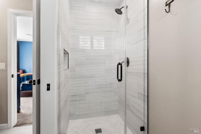 bathroom featuring an enclosed shower