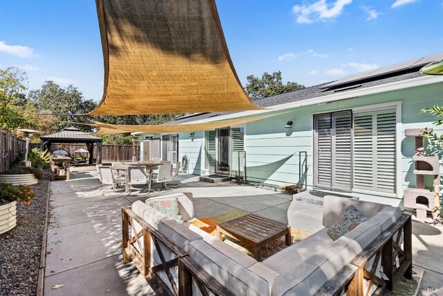 view of patio / terrace with a gazebo and outdoor lounge area