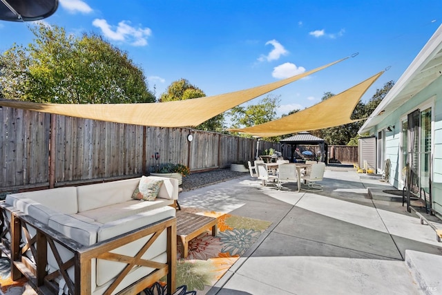 view of patio / terrace with a gazebo and outdoor lounge area