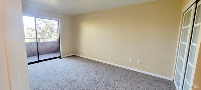 view of carpeted spare room