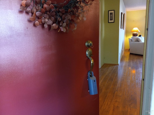 hall with wood finished floors