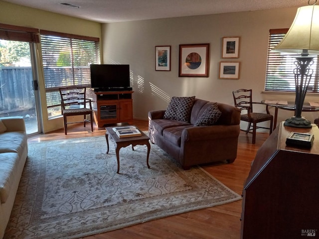 6472 Stone Bridge Rd, Santa Rosa, CA 95409 - living room featuring wood finished floors