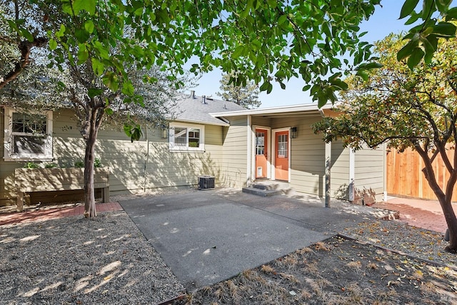 back of property with a patio area