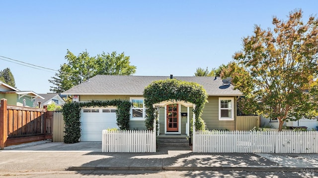 view of front of home with a garage