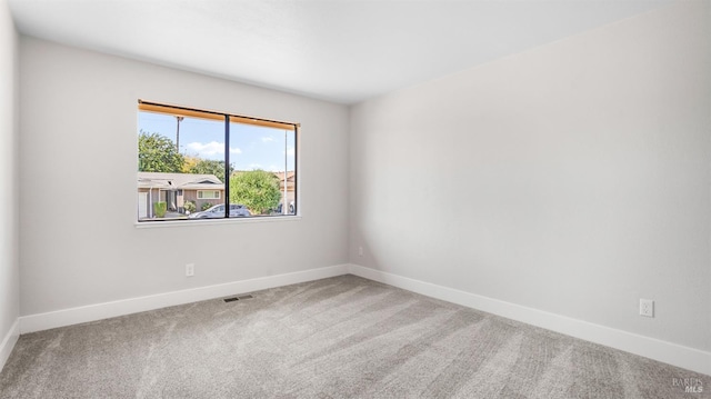 view of carpeted spare room