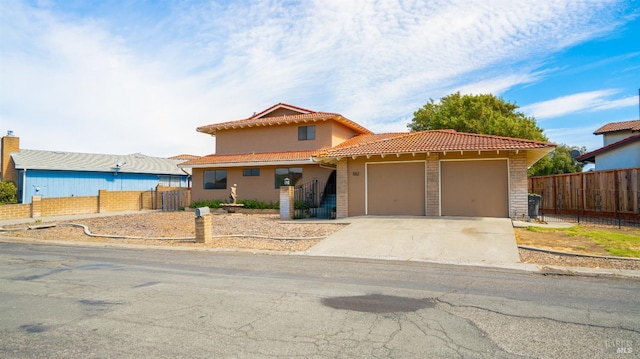 view of front of home with a garage