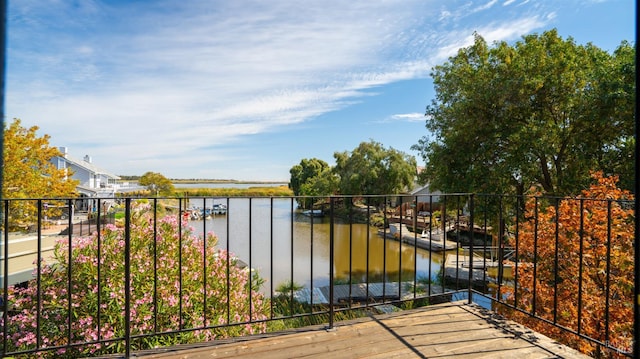 view of gate with a water view