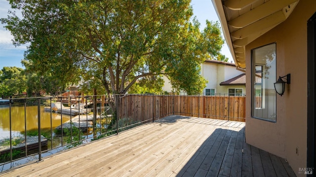 deck featuring a water view