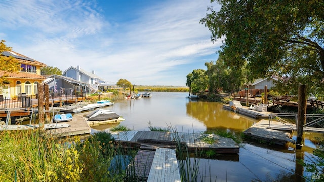 view of dock with a water view