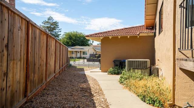 view of yard with central AC