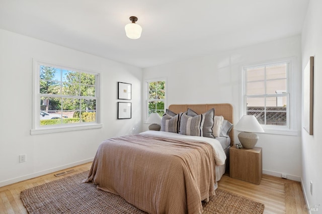 bedroom featuring light hardwood / wood-style floors