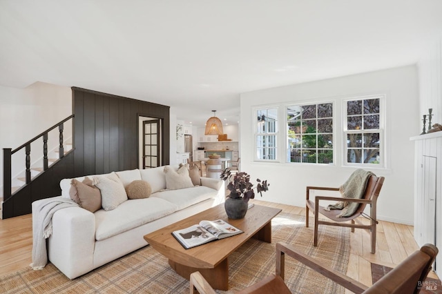 living room featuring a fireplace and light hardwood / wood-style floors