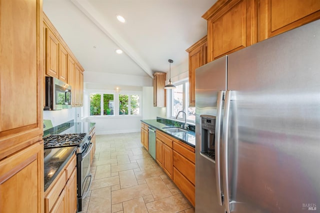 kitchen with stainless steel appliances, beam ceiling, decorative light fixtures, and sink