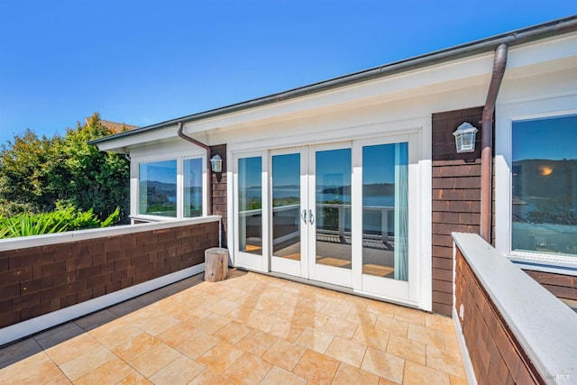 view of patio featuring french doors