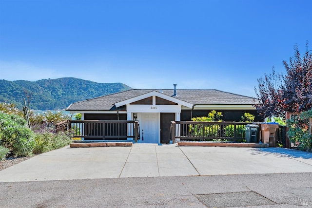 view of front facade featuring a mountain view