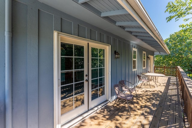 wooden deck featuring french doors