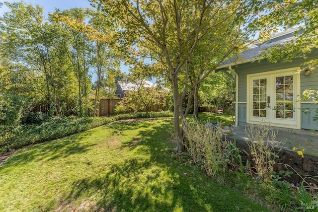 view of yard with french doors