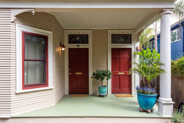 doorway to property featuring covered porch