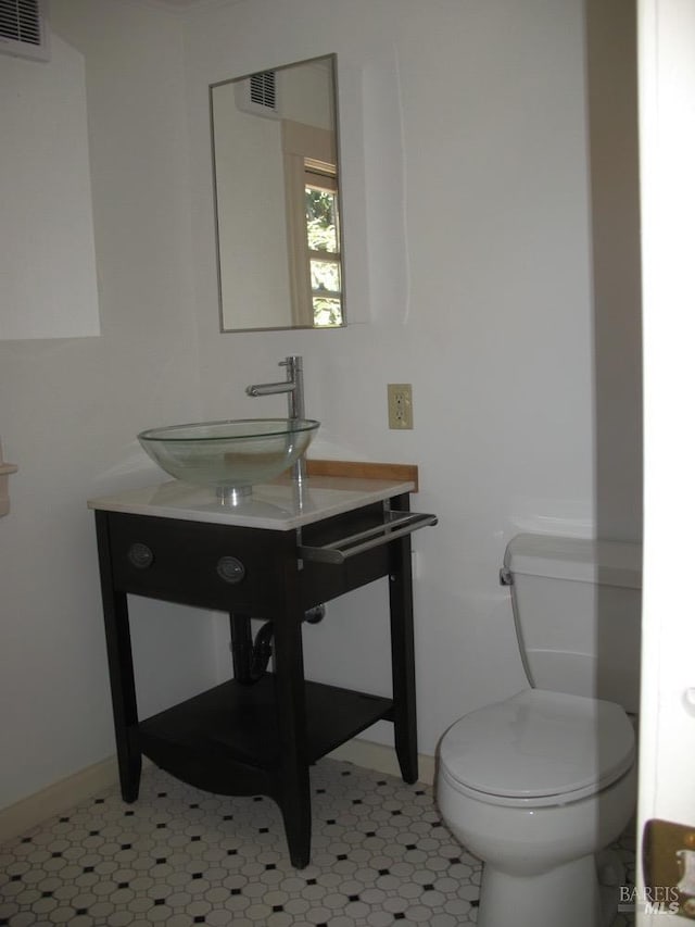 bathroom with sink and toilet