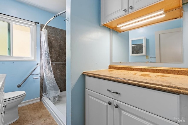 bathroom with toilet, tile patterned flooring, vanity, and a shower with shower curtain