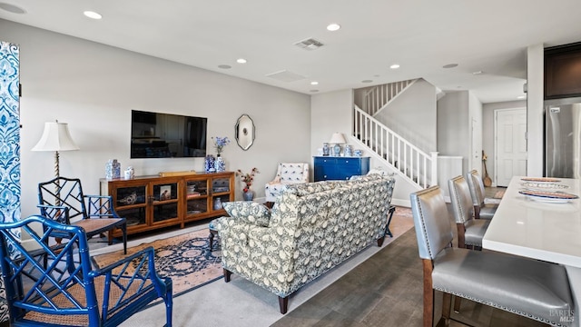 living room featuring dark wood-type flooring