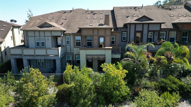 exterior space featuring a balcony